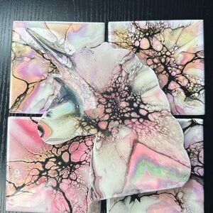 Handmade bloom technique resin topped coaster set.